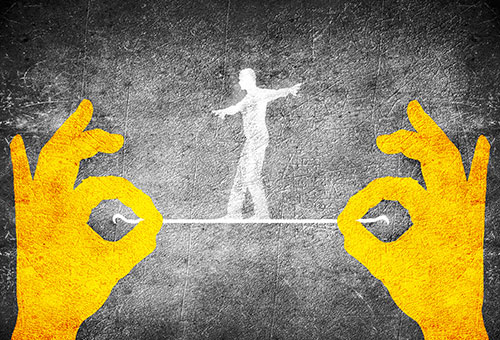 Image for aesthetic effect only - Walking-a-tightrope-or-catapulting-from-a-cannon