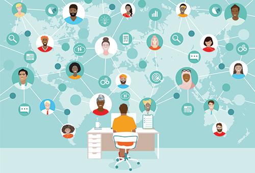 graphic of a person in a desk and in front of them is a world map with people spread around it all connected
