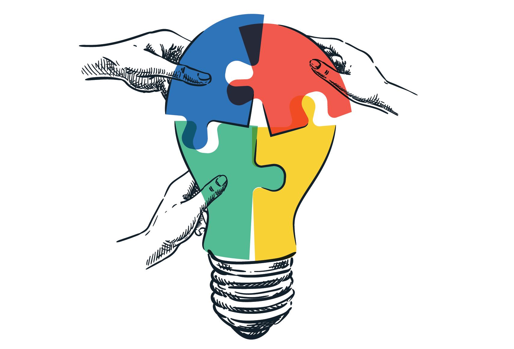 hands assembling a puzzle in the shape of a lightbulb
