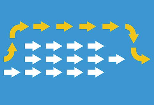 graphic of a group of white arrows pointing in the same direction on a blue background. from the back of them there is a yellow arrow that goes around the white ones to reach first